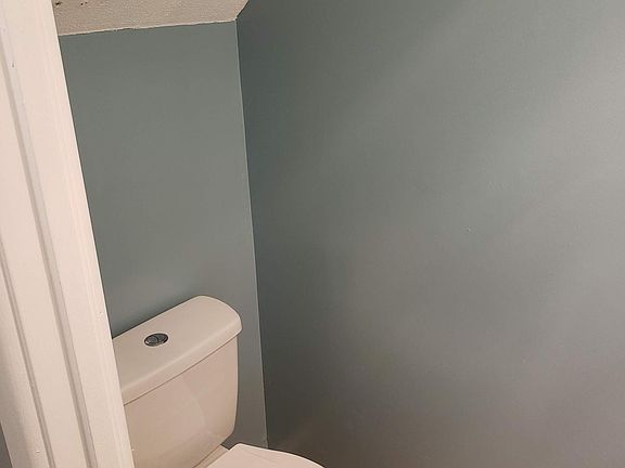 Half-bath Aquasense toilet.