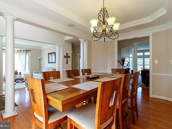 DINING ROOM WITH CHAIR RAIL AND CROWN MOLDING