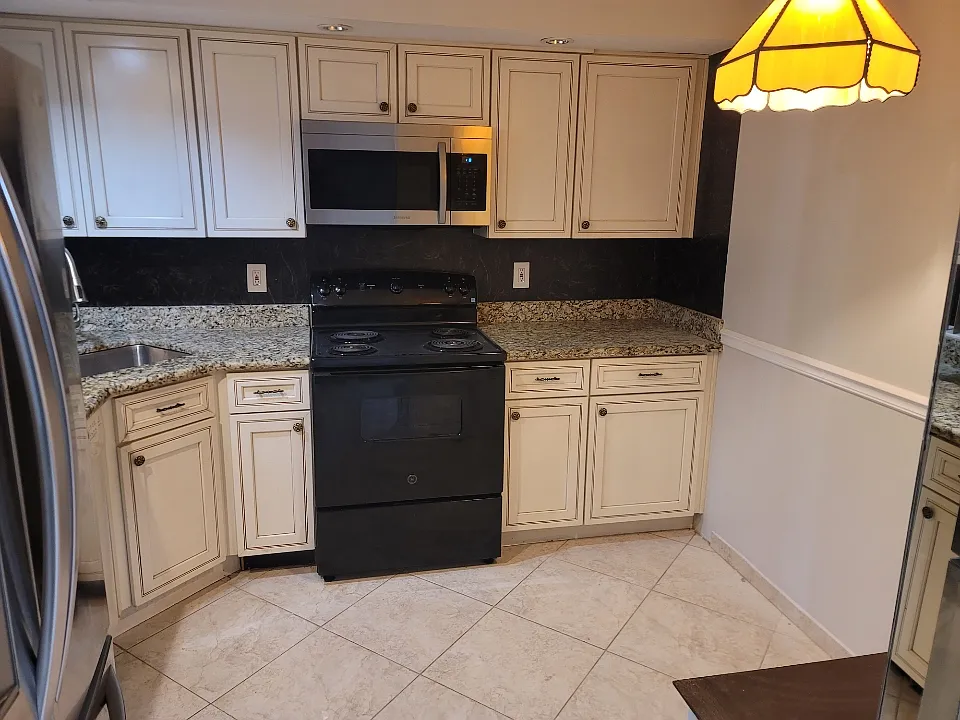 Building Photo - 8657 Boca Glades Blvd W #C