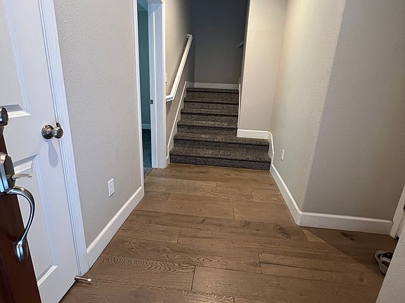 entrance into the home from the ground foor. First room on the left, garage on the right