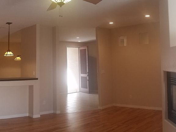 Living rm, home office nook, natural gas fireplace.