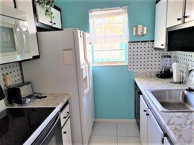 637 NE 6th Ct #L — Photo 31