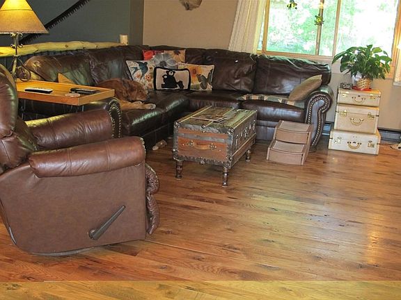 Living room, look at the beautiful Hickory Wood Floors