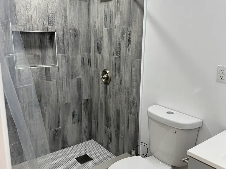 New Bathroom with Tile throughout apt