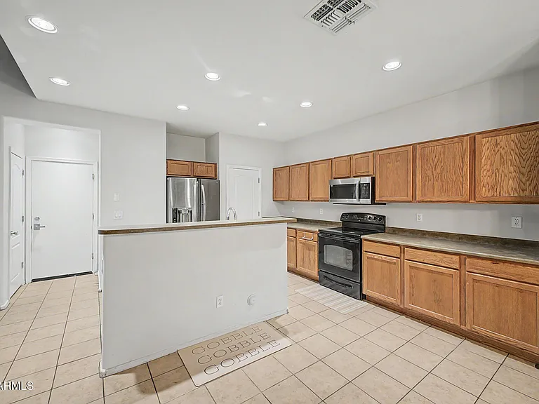 1944 N 77th Gln — Photo 10