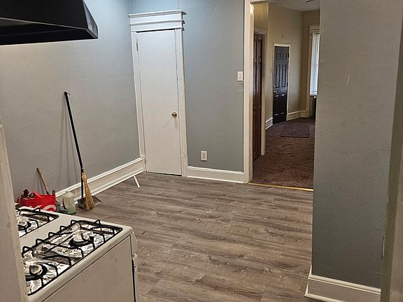 Kitchen & partial living room view from bedroom