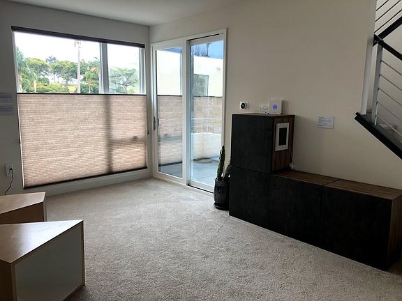 living room and entrance to spacious patio