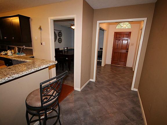 Many upgrades as you enter the home including tile flooring throughout, paint, and a remodeled kitchen.