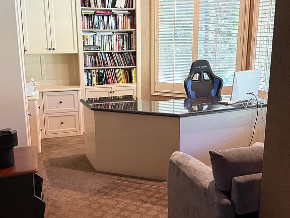 Office/Den, located on the Main Level, at the front of the home