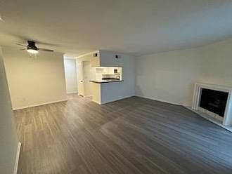 Open-concept living room, kitchen, dining area