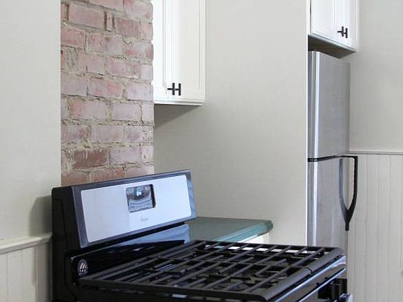 Exposed brick in kitchen