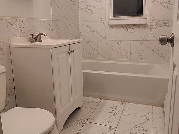 Typical Bathroom Renovation with brand new fixtures and tile!