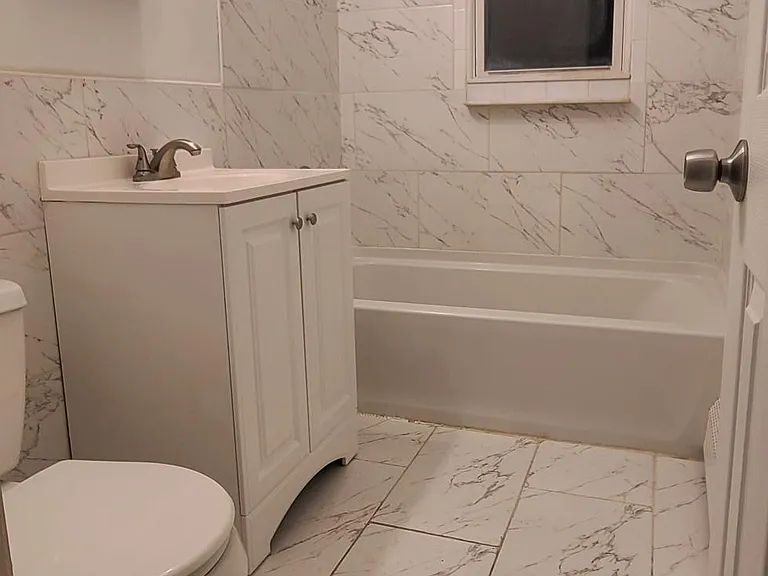 Typical Bathroom Renovation with new fixtures and tile!