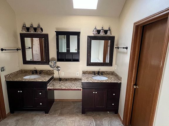 Large master bathroom with double vanities