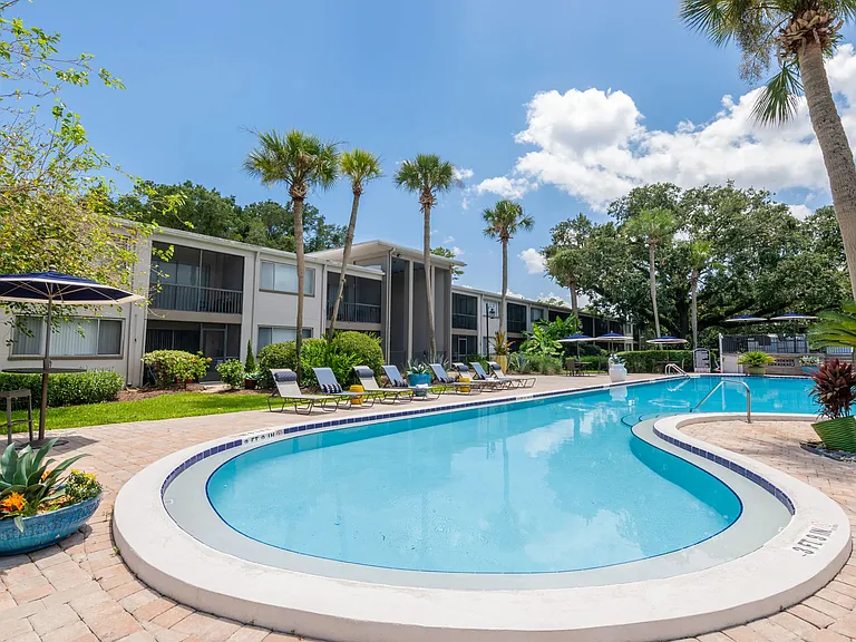 Surrender to serenity on our resort-style sundeck, a haven of bliss by the tranquil waters of the inviting pool.