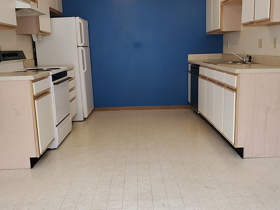 Kitchen with stove, fridge, dishwasher & garbage disposal included.