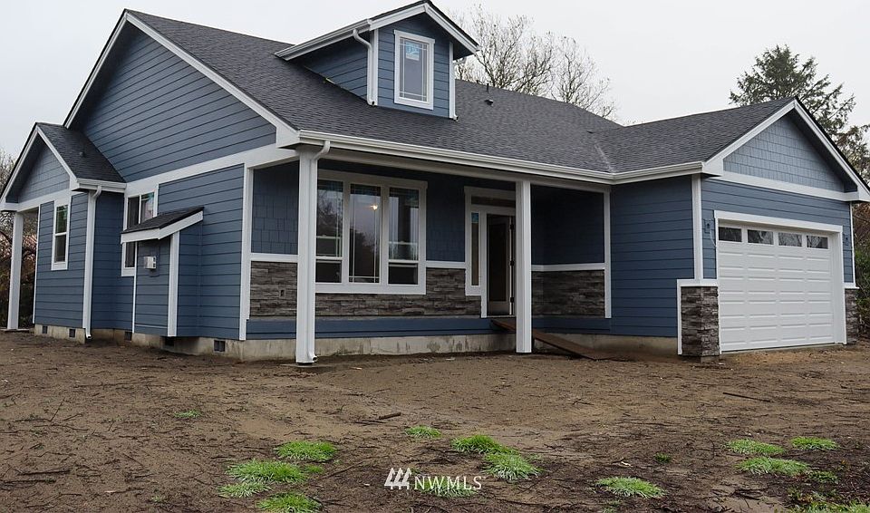 Notice the cupola for added charm & character. Wide covered porches, front and back.