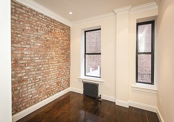 3rd image of 50 E 3rd St APT C