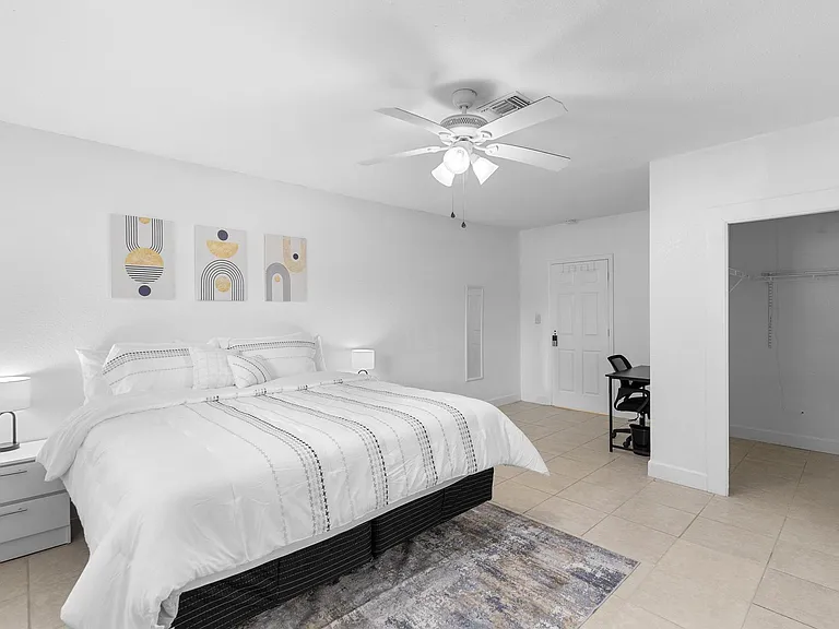 Room #7 The Zen Den 

Double-occupancy king suite with TV, walk-in closet & shared bath Sanford, FL