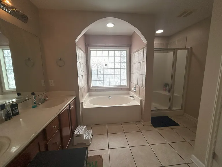 Large MB Bathroom with modern lighting