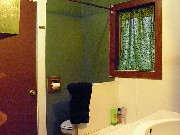 Bathroom w/ lots of storage.