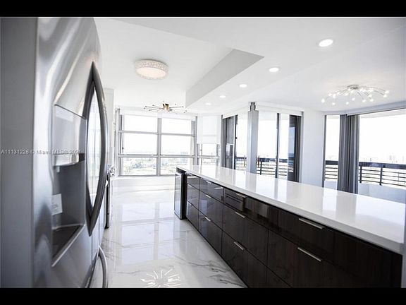 5th image of 3500 Mystic Pointe Dr APT 3506
