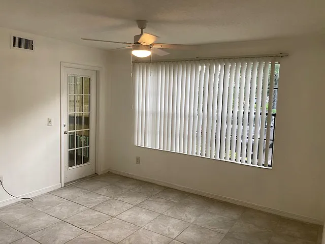 Living Room area - 7667 N Wickham Rd #607