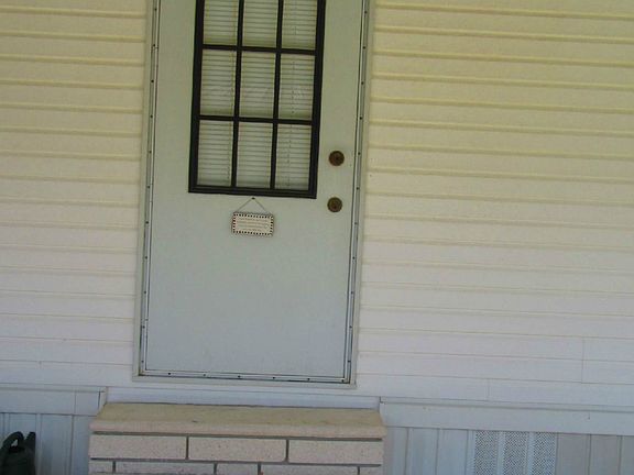 From Carport into Living Room