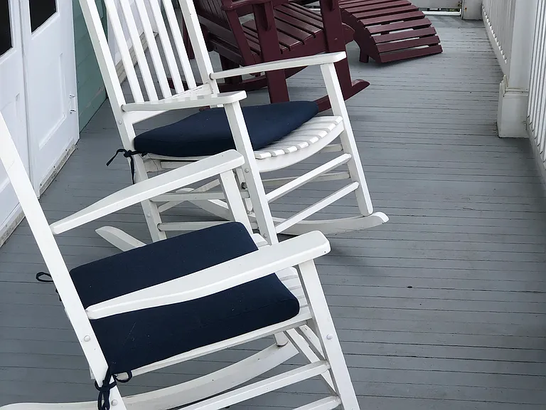 Your rocking chair front porch overlooking boat traffic on Mississippi river