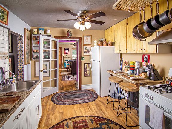 OLD PHOTO OF UPSTAIRS KITCHEN AREA WITH BREAKFAST NOOK