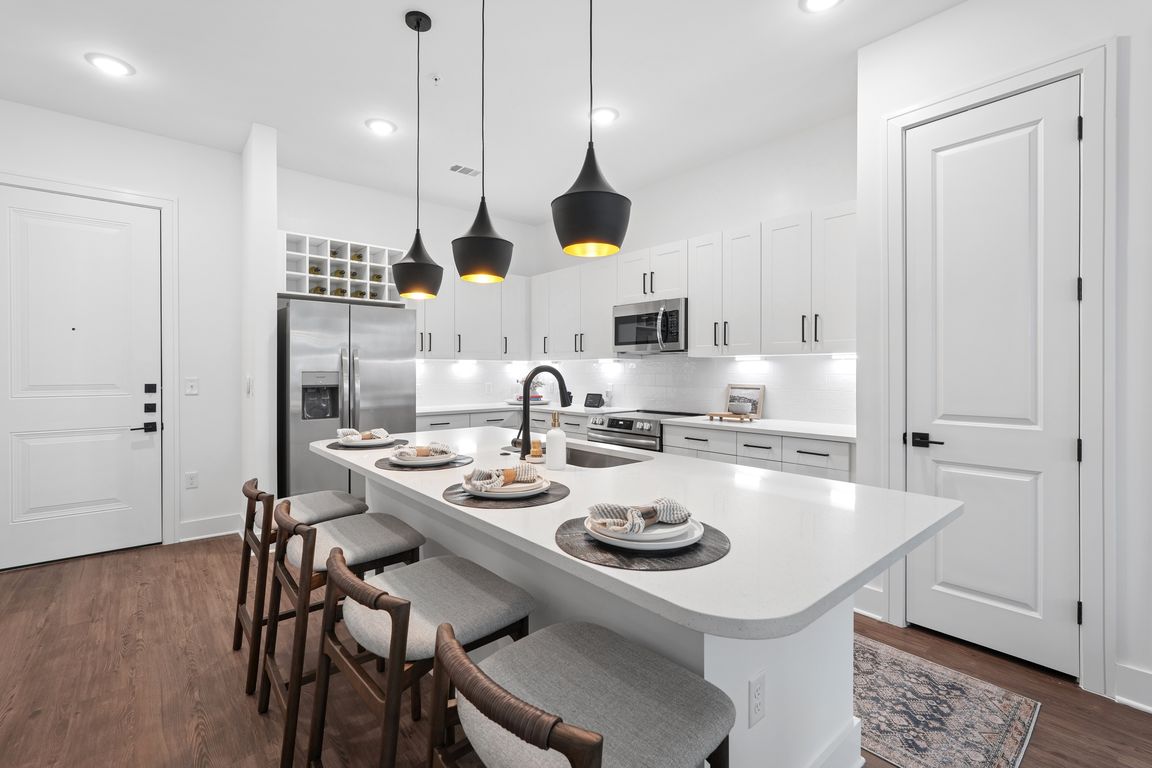 Kitchen with Quartz Countertop and Stainless Steel Appliances