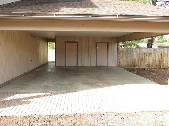 Covered parking with storage room