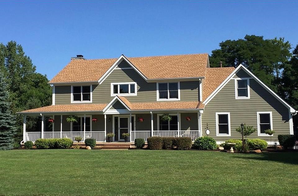 Welcome home to 6114 Crossfield Trail! Amazing curb appeal, brand new windows, landscaping and exter