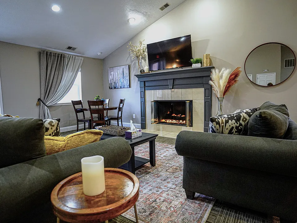 The clubhouse at Hamilton Station feels like an extension of home_with a cozy fireplace, soft seating, and a full kitchen nearby, it's the perfect spot to relax or host.