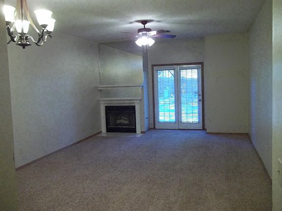 Living Room, Fireplace, French Doors, New Ceiling Fan & Chan