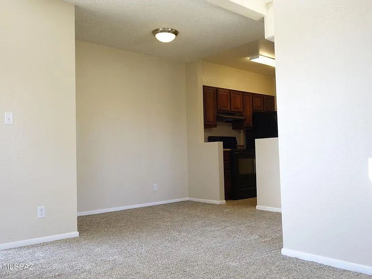view of dining area and kitchen from living room