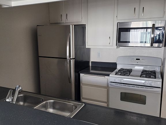 Kitchen with stainless steel appliances