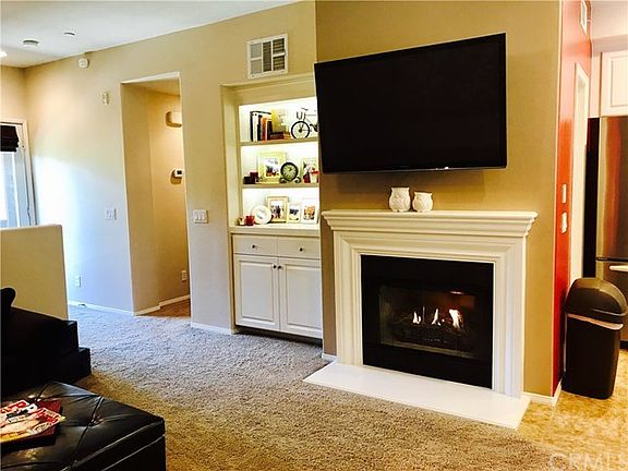 Flip a switch and enjoy the ambiance of the living room fire