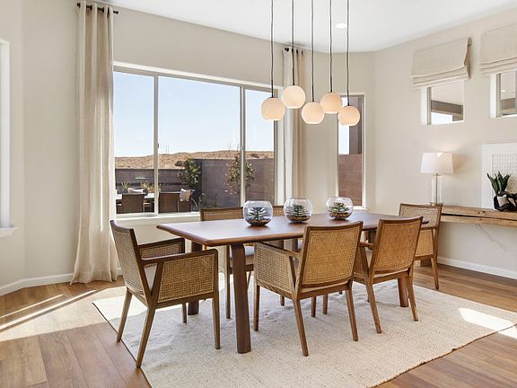 The large windows and overhead accent lighting fixture https pultegroup.picbring plenty of natural