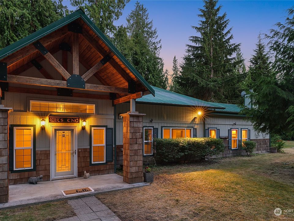 The craftsmanship and detail of the front entry is stunning.>