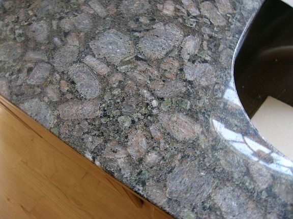 GRANITE IS IN & BEAUTIFUL...HAS GREEN IN IT!