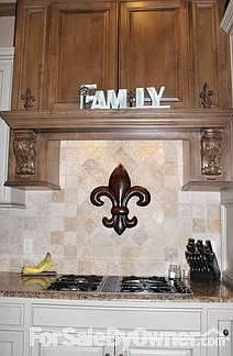 Stove and Vent Hood
						:
						Gas stove with beautiful wood work and storage!