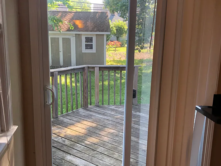 View of deck and backyard