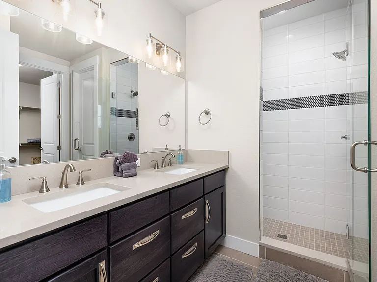 Master bathroom including double vanities