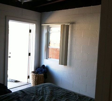 Bedroom w/bath & rear patio