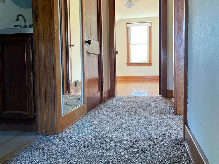view of 2nd bedroom from upstairs hallway