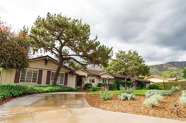 Front of home facing northeast. Look at the beautiful foothills in the back. What a beautiful settin