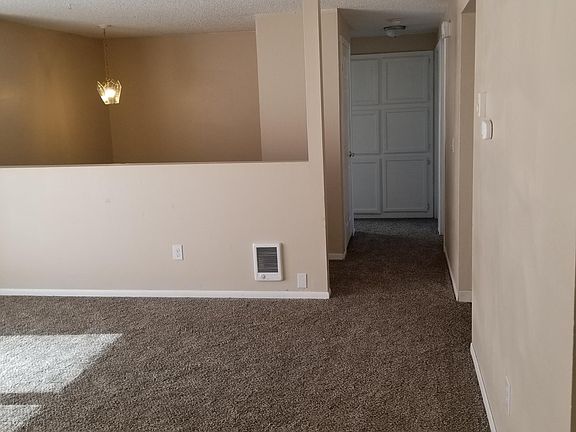 Living Room. 2 Bedrooms Upstairs, 1 Bedroom Down Stairs. Large Family Room Down Stairs also