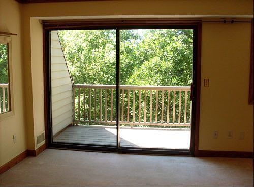 Dining room with door to deck area.
