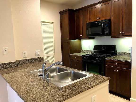 Kitchen with Granite counter tops and new cook top